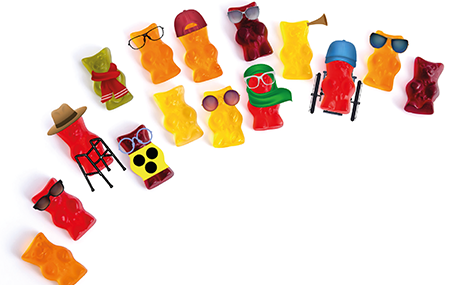 Die Gummibärchen symbolisieren die Idee von Inklusion, Teilhabe und einem bunten Miteinander.